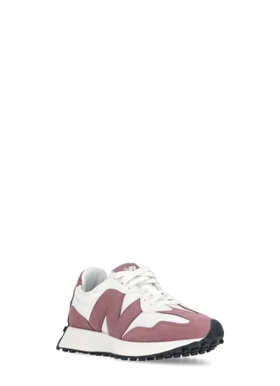 Shop New Balance Sneakers Pink