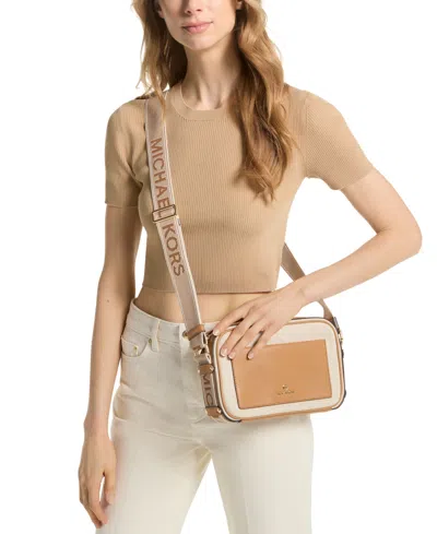 Shop Michael Kors Michael  Maeve Large East West Pocket Crossbody In Spiced Coral