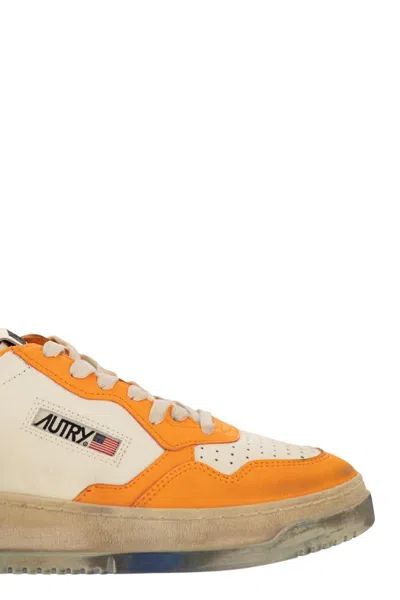 Shop Autry International Srl  In White Orange And Blue Worn Effect Leather In Multicolour