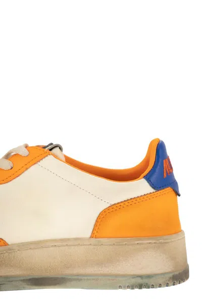 Shop Autry International Srl  In White Orange And Blue Worn Effect Leather In Multicolour