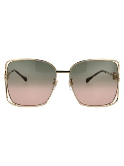Shop Gucci Sunglasses In 001 Gold Gold Green