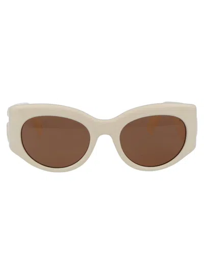 Shop Gucci Sunglasses In 004 Ivory Ivory Brown