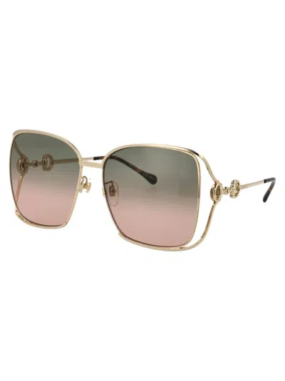Shop Gucci Sunglasses In 001 Gold Gold Green