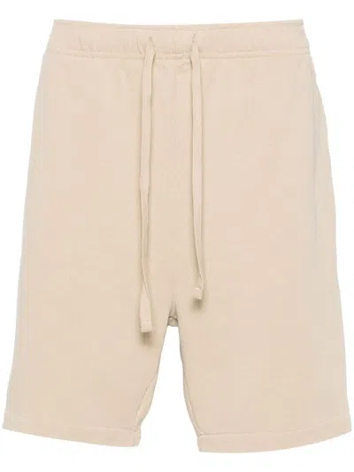 Shop Polo Ralph Lauren Cotton Jersey Bermuda Shorts With Drawstring Waist In Beige