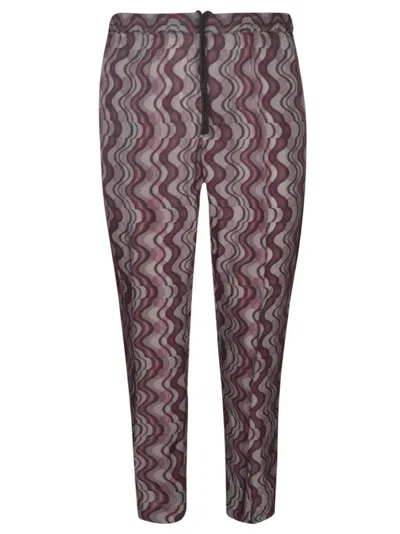 Shop Dries Van Noten Parkino Trousers In Purple
