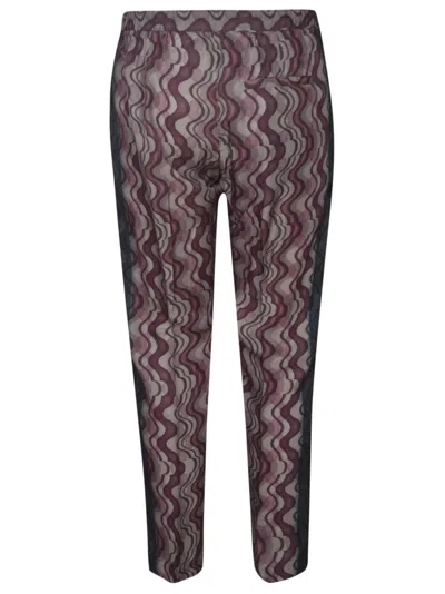 Shop Dries Van Noten Parkino Trousers In Purple
