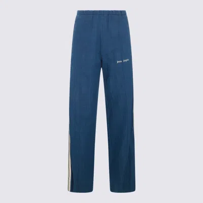 Shop Palm Angels Trousers In Indigo Blue