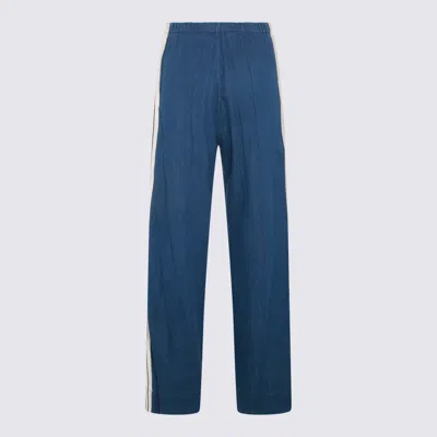 Shop Palm Angels Trousers In Indigo Blue