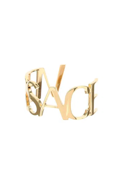Shop Versace Stiff Logoed Bracelet In Oro
