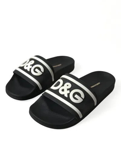 Shop Dolce & Gabbana Chic Logo-embossed Black Slides For Elegant Women's Comfort In Black And White