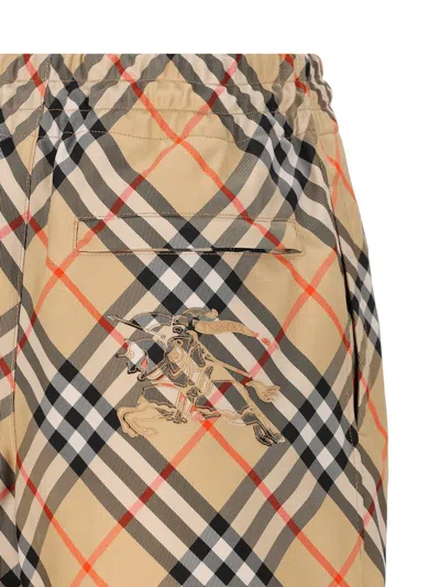 Shop Burberry Shorts In Sand Ip Check