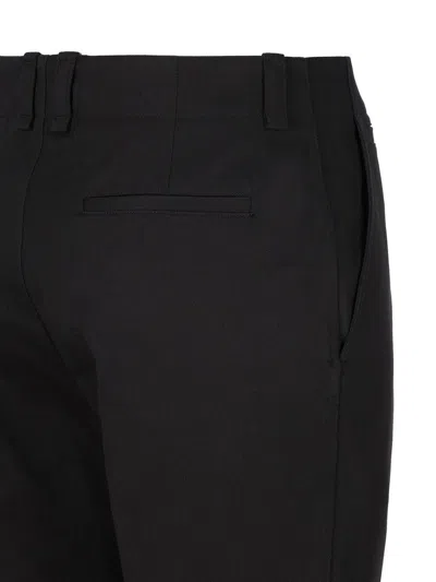 Shop Saint Laurent Trousers In Black