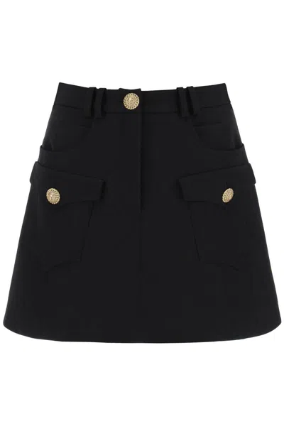 Shop Balmain Trapeze Mini Skirt With Embossed Buttons In Nero