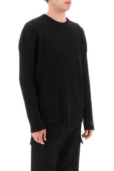 Shop Versace Ribbed-knit Sweater With Leather Straps In Nero