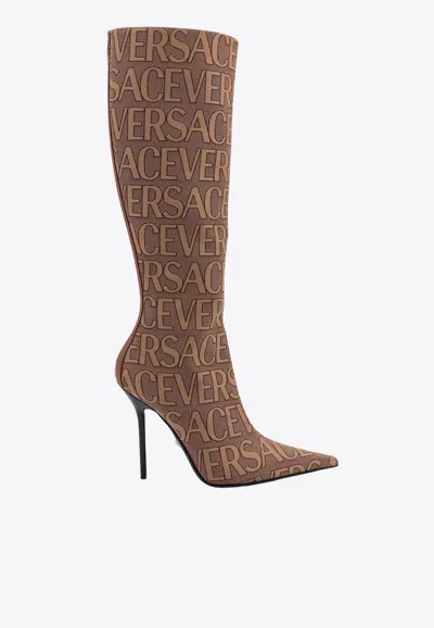 Shop Versace 100 All-over Logo Knee-high Boots In Brown