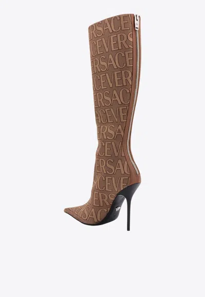 Shop Versace 100 All-over Logo Knee-high Boots In Brown