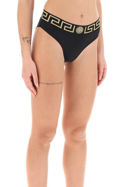 Shop Versace Bikini Bottom With Greca Band In Nero