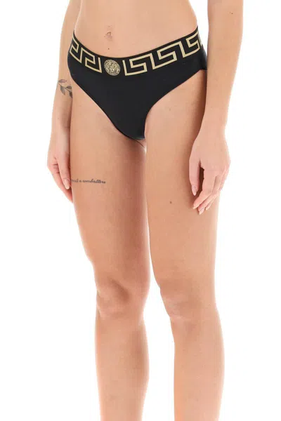 Shop Versace Bikini Bottom With Greca Band In Nero