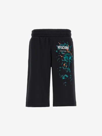 Shop Moschino Boys Paint Splash Logo Shorts In Black