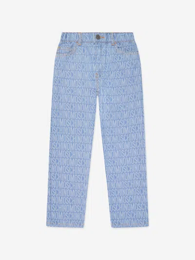Shop Moschino Boys All Over Logo Jeans In Blue