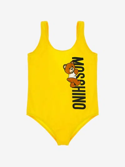 Shop Moschino Girls Teddy Logo Swimsuit In Yellow