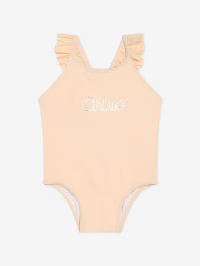 Shop Chloé Baby Girls Logo Swimsuit In Pink
