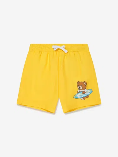 Shop Moschino Boys Teddy Surfer Swim Shorts In Yellow
