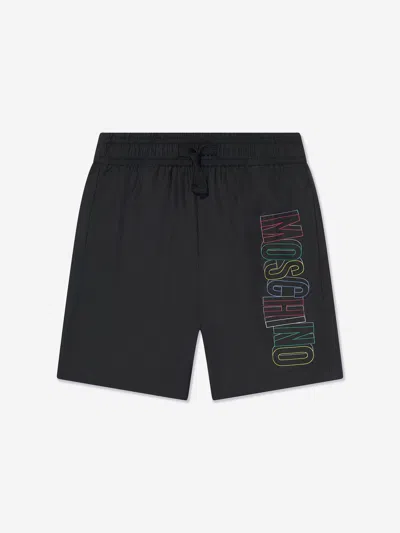 Shop Moschino Boys Logo Swim Shorts In Black