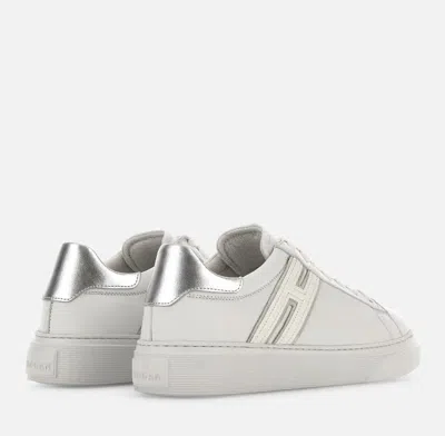 Shop Hogan Sneakers In White