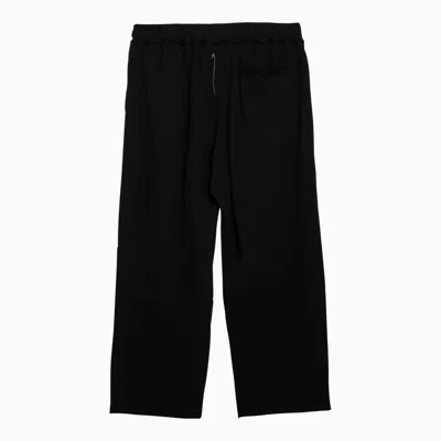 Shop Airei Trousers In Black