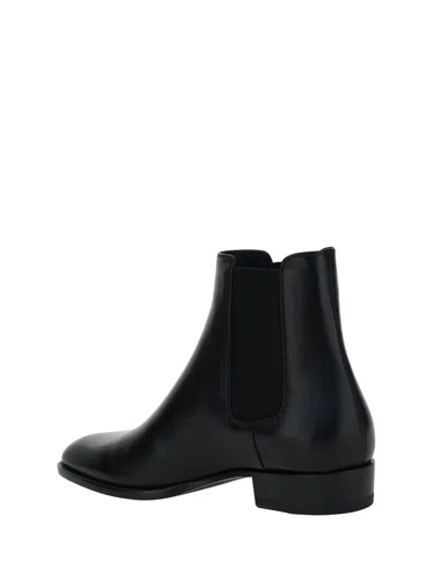 Shop Saint Laurent Boots In Black