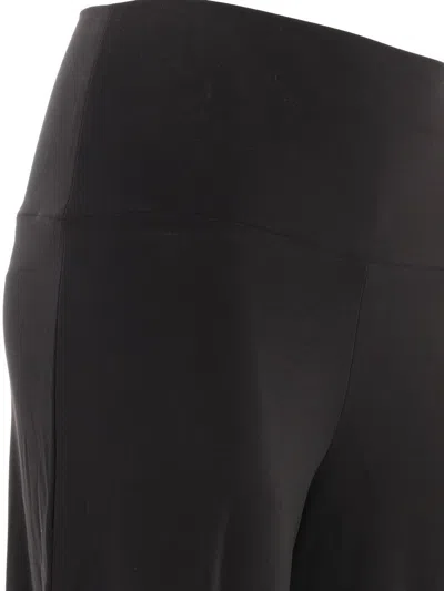 Shop Norma Kamali Straight Leg Trousers In Black
