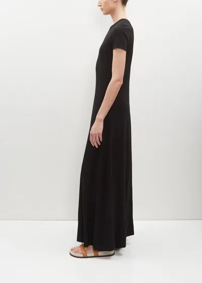 Shop Totême Fluid Stretch Viscose Jersey Dress In Black 001