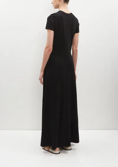 Shop Totême Fluid Stretch Viscose Jersey Dress In Black 001