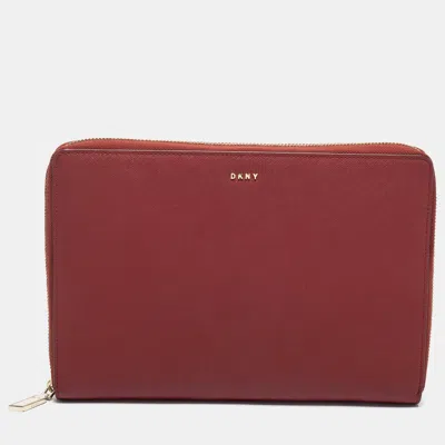 Shop Dkny Leather Large Bryant Zip Around Clutch In Red