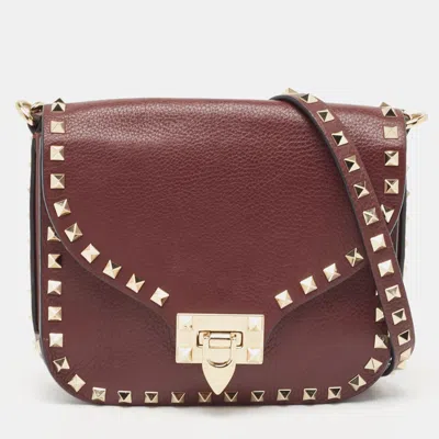 Shop Valentino Leather Rockstud Flap Crossbody Bag In White