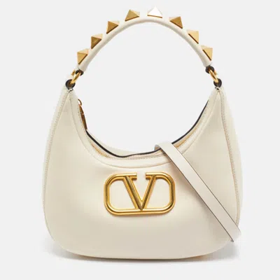 Shop Valentino Offleather Stud Sign Hobo In White