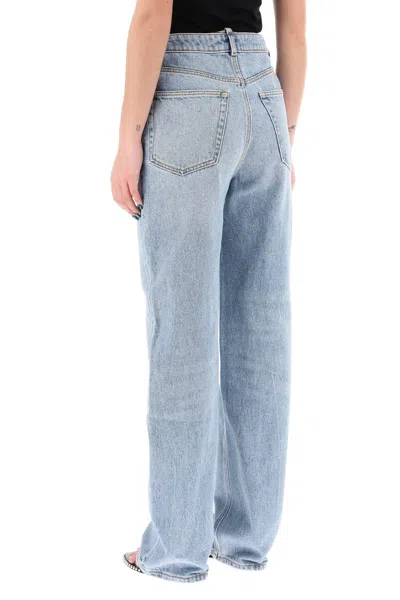 Shop Alexander Wang Asymmetric Waist Jeans With Chain Detail.