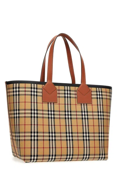 Shop Burberry Women 'london' Shopping Bag In Brown