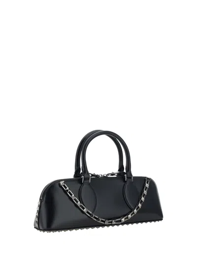 Shop Valentino Garavani Women  Garavani Rockstud Duffle Handbag In Black
