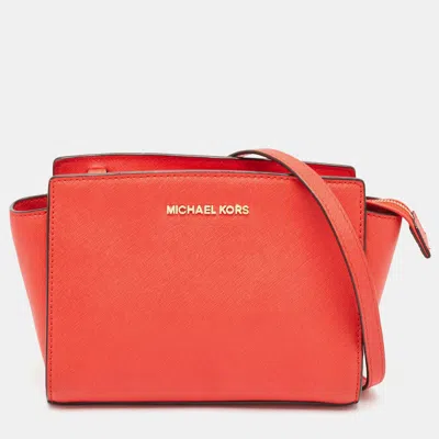 Shop Michael Michael Kors Saffiano Leather Medium Selma Crossbody Bag In Red