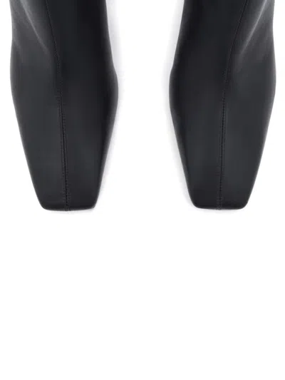 Shop Courrèges Boots In Black