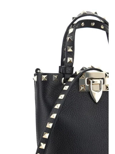 Shop Valentino Garavani Women  Garavani Rockstud Handbag In Black