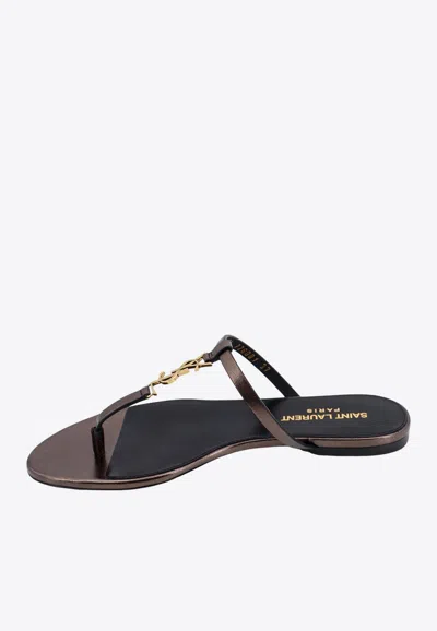 Shop Saint Laurent Cassandra Leather Flat Sandals In Brown
