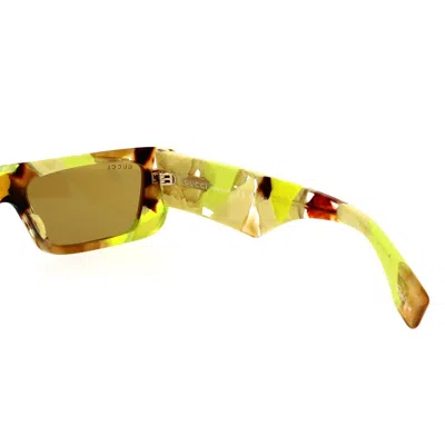 Shop Gucci Eyewear Sunglasses In Yellow