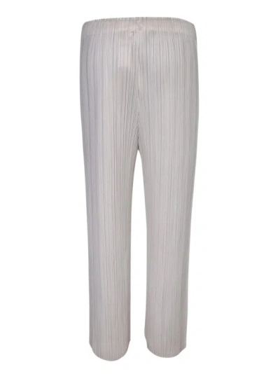 Shop Issey Miyake Pleated Trousers In White