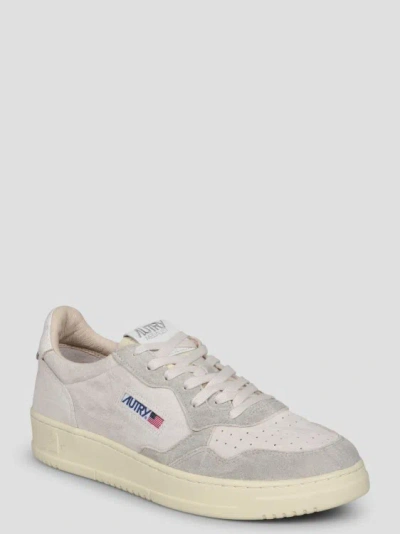 Shop Autry Medalist Low Bi-color Sneakers In White