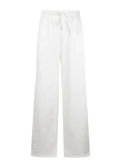 Shop Gucci Embroidered Cotton Jersey Trousers In White