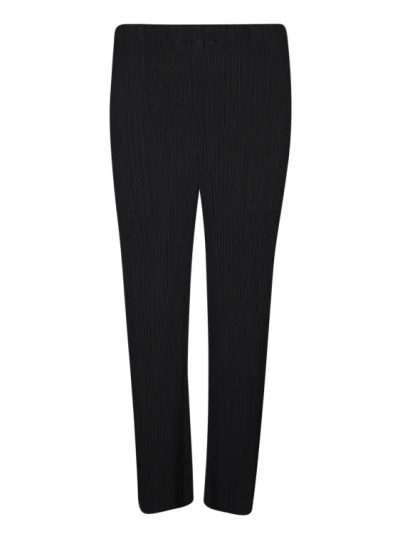 Shop Issey Miyake Pleated Trousers In Black