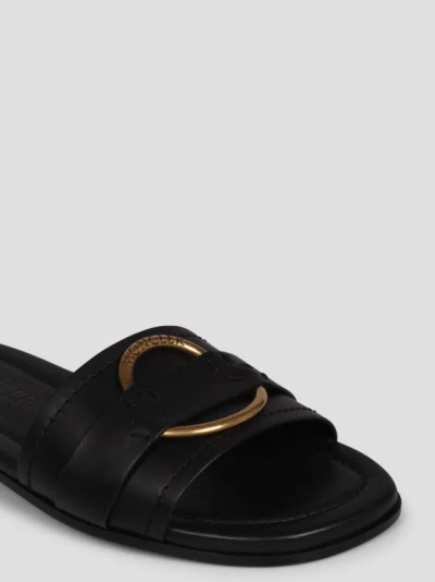 Shop Moncler Bell Leather Sliders In Black